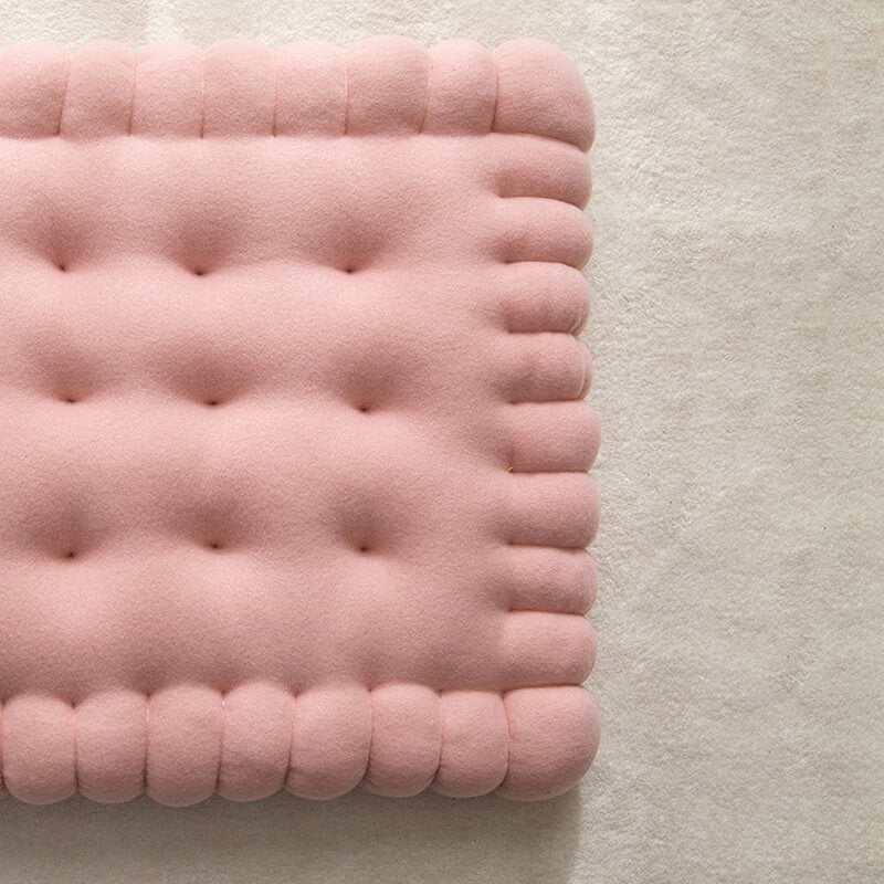 Padded dog bed made of biscuit dough.