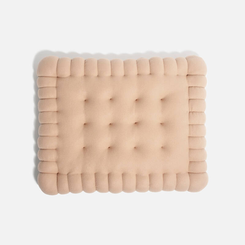 Padded dog bed made of biscuit dough.